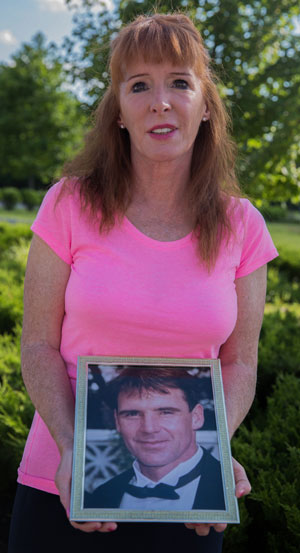 Lawyer Patricia Rouse holds a photo of her brother James, who died of Legionnaires’ disease at age 52. Rouse has filed several official requests with the city of New York for information about how he contracted the disease. (Karl Schneider/News21)