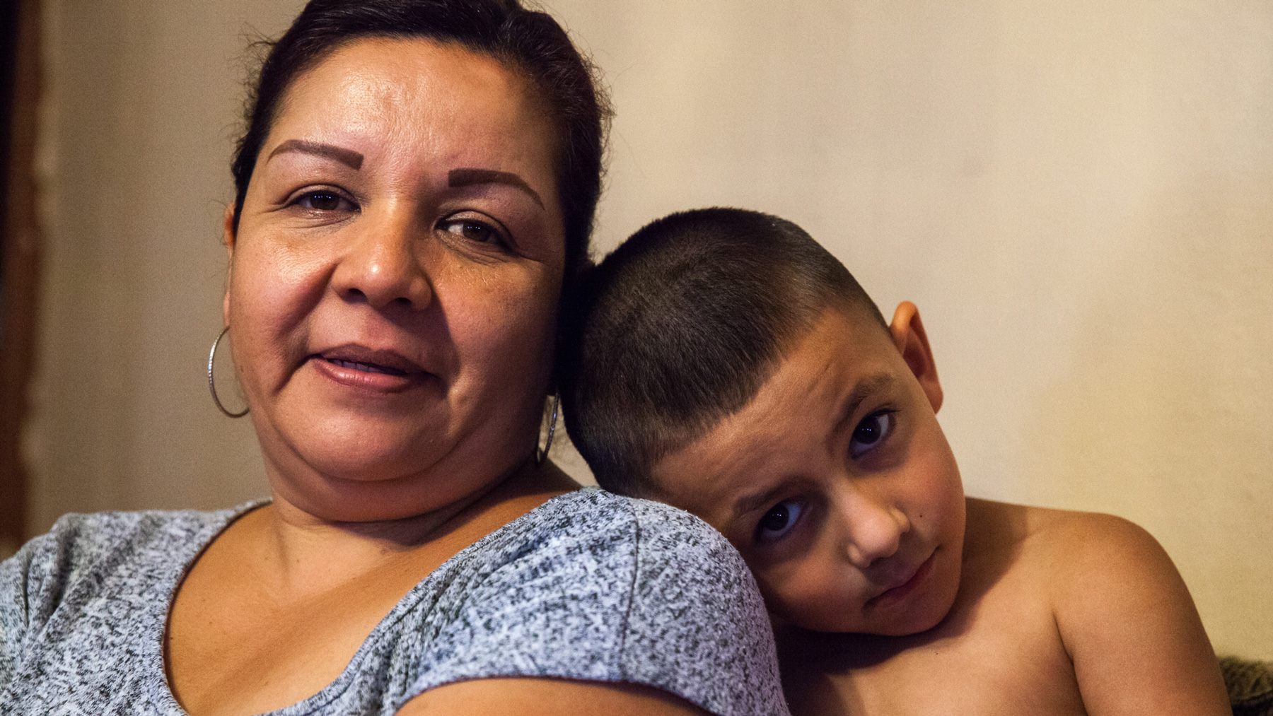 Lorena Hernandez, left, and Rosa Maria Peña live in Tornillo, Texas, which has tested positive for arsenic in its water. “You get used to it,” Peña said about the tap water. (Maria Esquinca/News21)