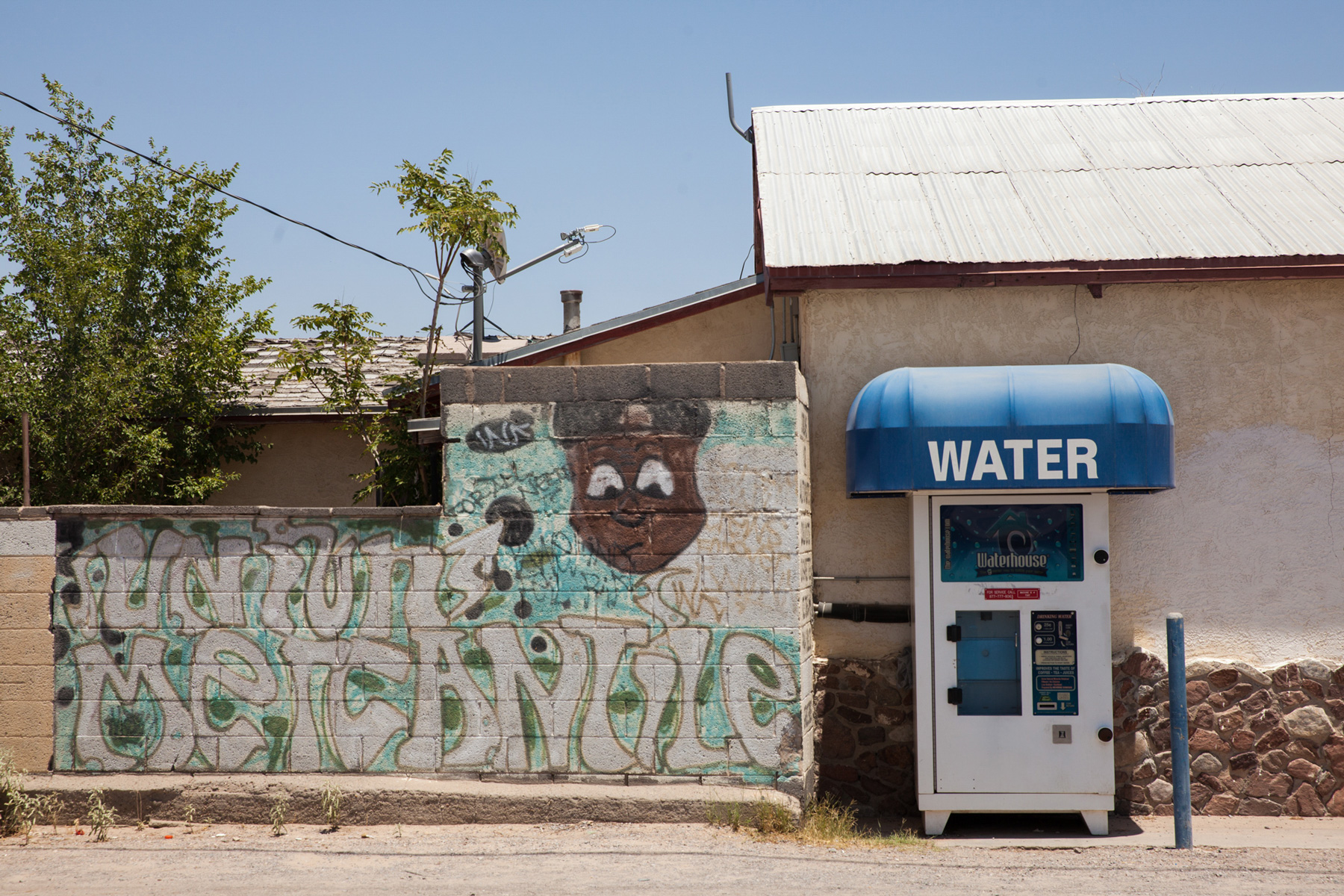 The water in La Union, N.M., had tested positive for arsenic above the legal limit since 2009. Residents said they still don’t drink the tap water, opting instead to fill at the local filling station.  (Maria Esquinca/News21)