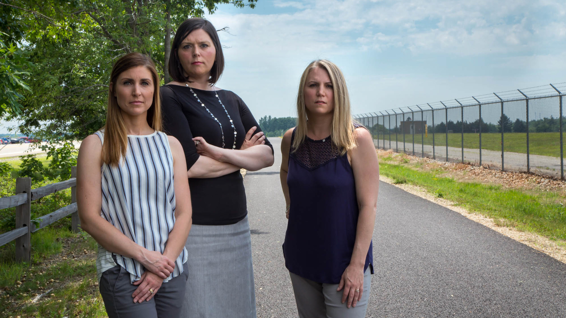Andrea Amico (from left), Michelle Dalton and Alayna Davis, stand in front of the contaminated Haven Well on the former Pease Air Force Base. The women founded Testing for Pease, a community activist group to fight for health testing for the people who had been drinking water on the base, including their children who attended a day care there. (Adrienne St. Clair/News21)